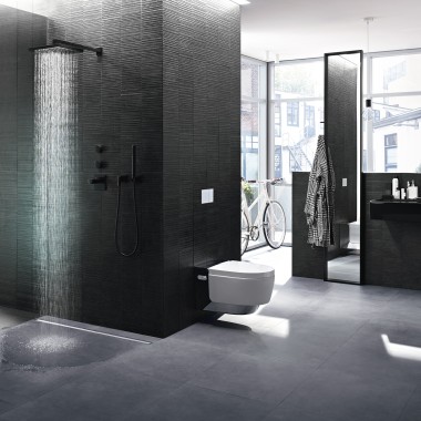 Bathroom with a freestanding shower and Geberit CleanLine shower channel