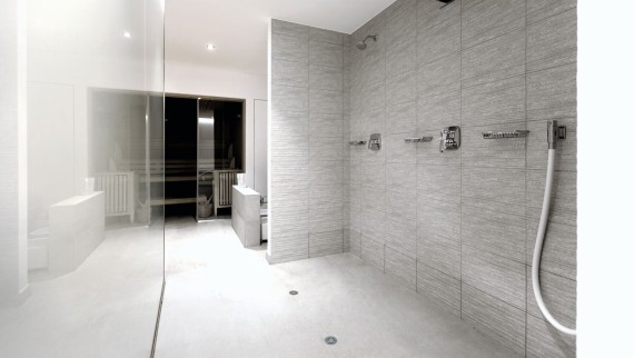 Semipublic sanitary room with Geberit vinyl (PVC) shower floor drain