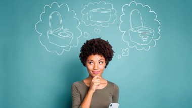 Woman thinking about her favourite toilet